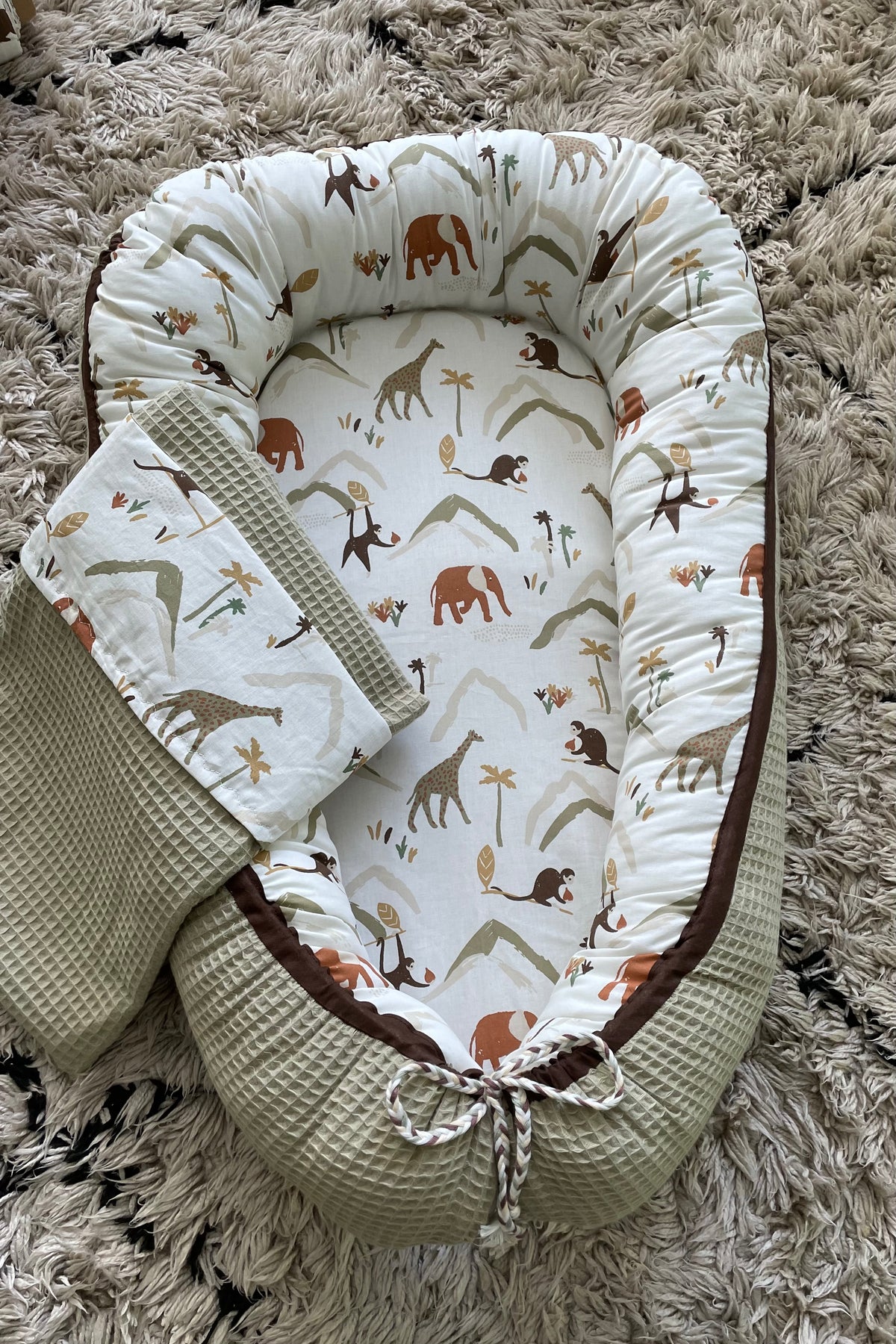Babynestje olijf jungle