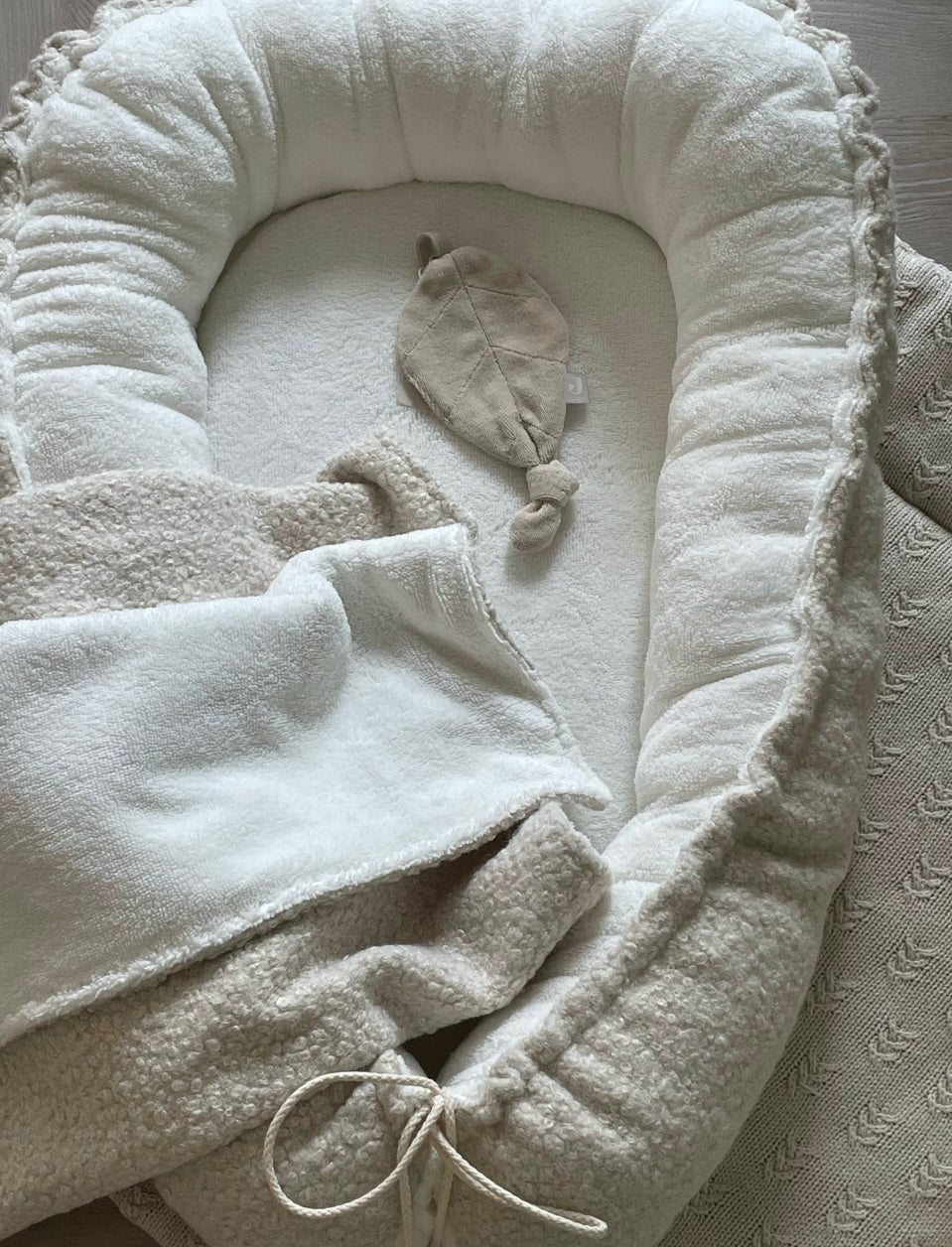 Babynestje bouclé naturel