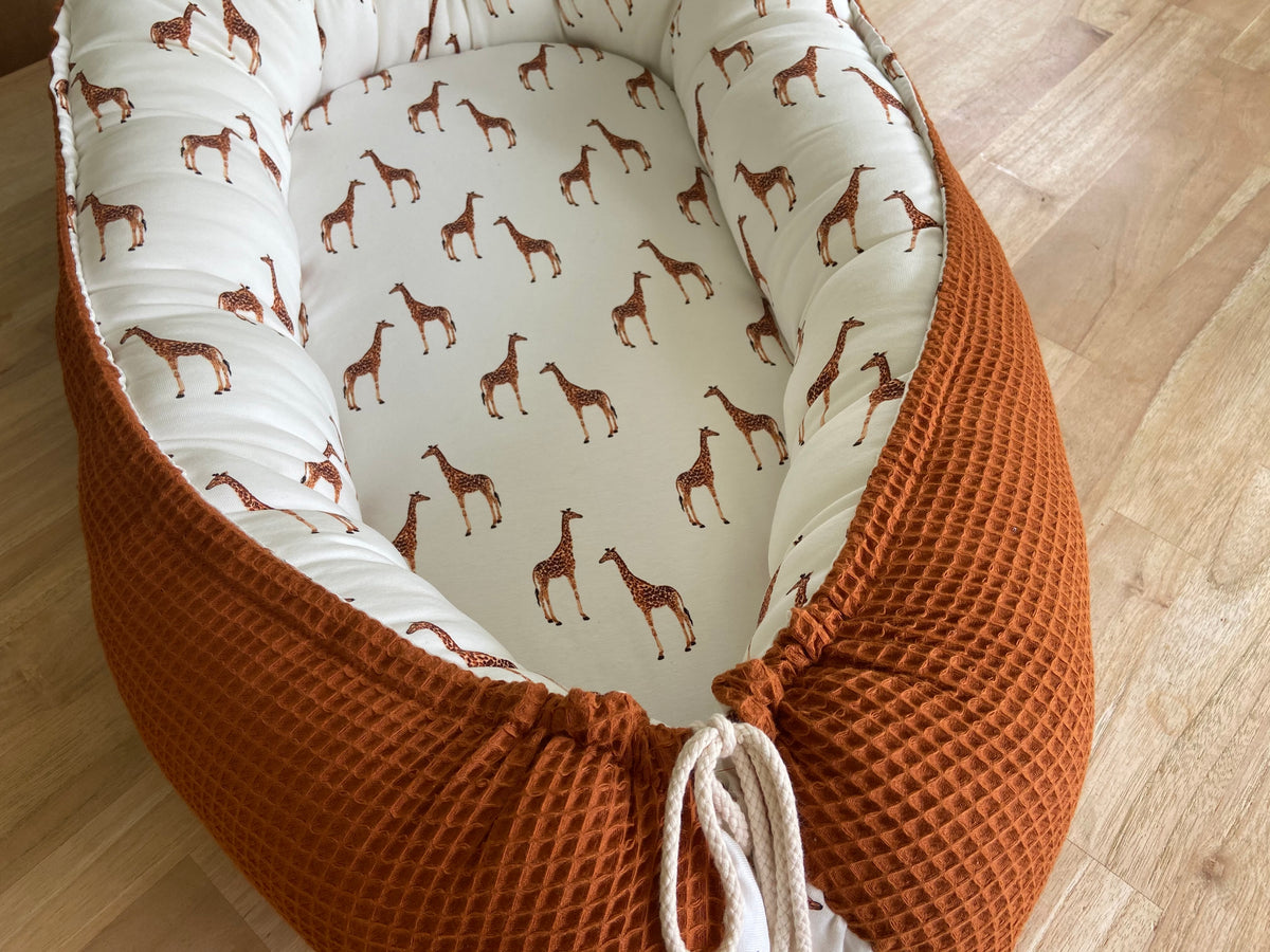 Babynestje giraffen